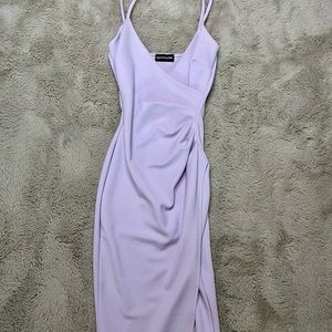 Pastel lavender mid length wrap dress.